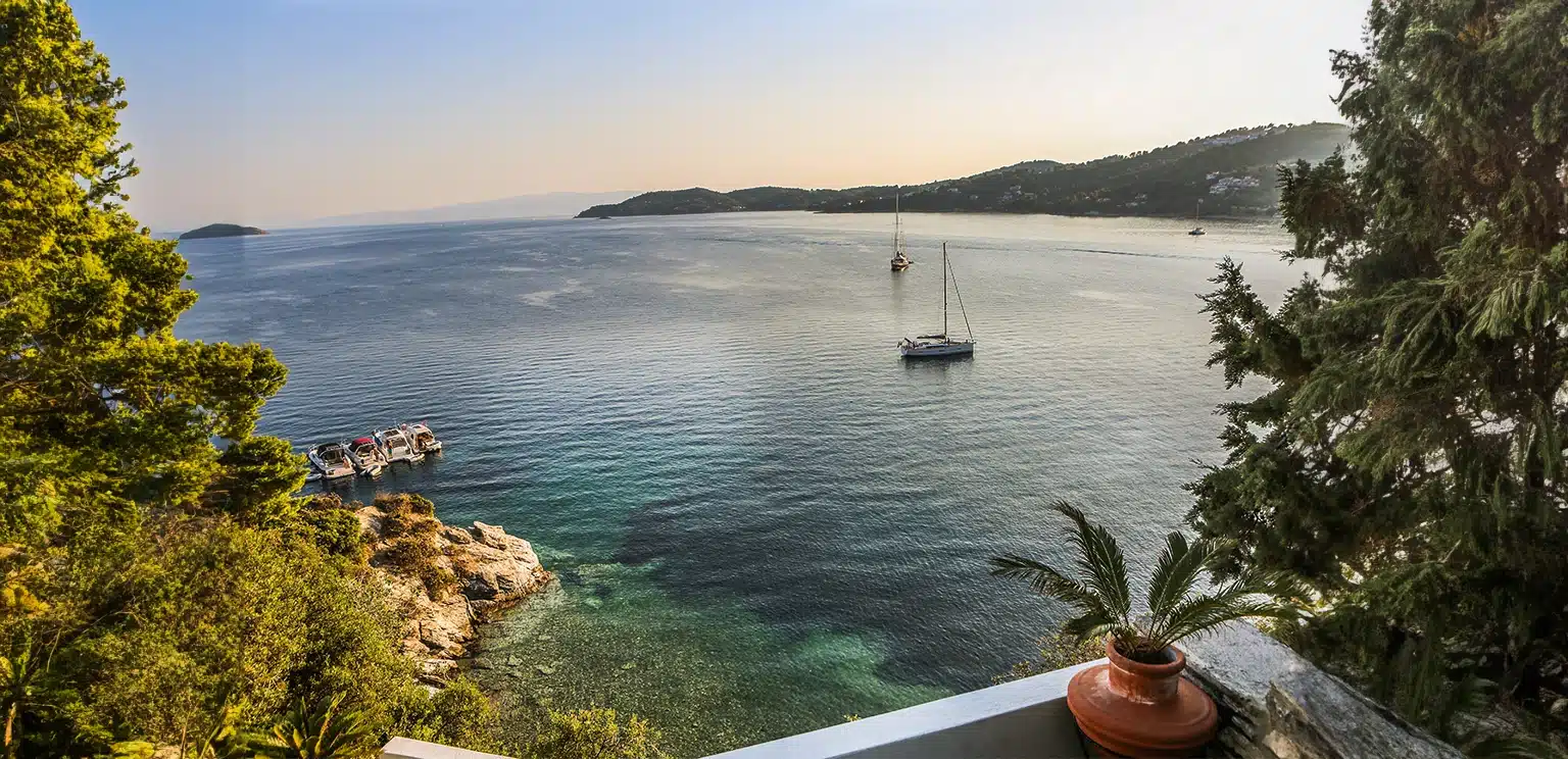 Kommeno bay with a boat at Corfu east side