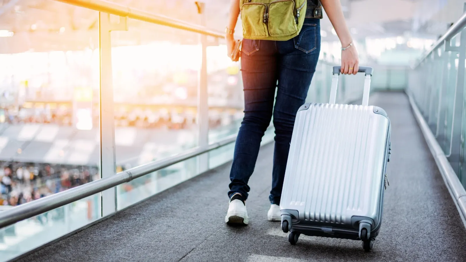 a person with a backpack and luggage