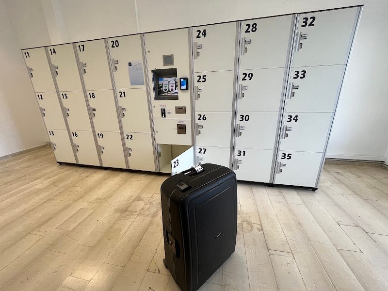 Traveler with suitcase at Flexy Luggage storage next to Corfu Airport